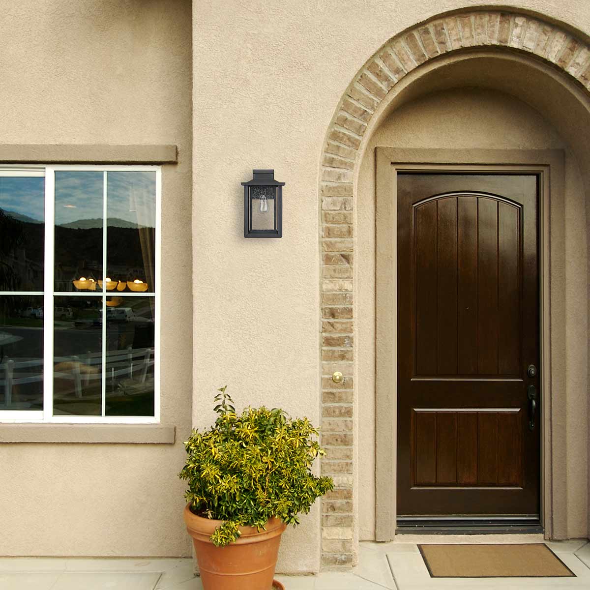 Quoizel Outdoor Wall Light from the Wakefield range. Wakefield 1 Wall Lantern - Medium Product Code = QZ-WAKEFIELD-M-TBK