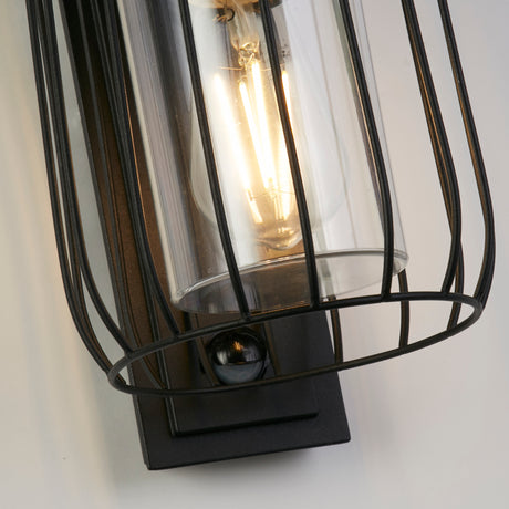 Searchlight Electric Reed 1Lt Wall Light with PIR , Black Metal and PC Shade 44610BK-PIR