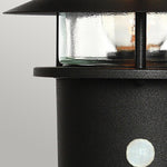 Elstead Lighting Pedestal Lantern from the Helsingor range. Helsingor 1 Light PIR Pedestal Lantern Product Code = HELSINGOR-PIR-PED-BK