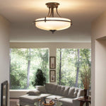 Quoizel Ceiling Semi-Flush from the Griffin range. Griffin 4 Light Semi-Flush  Product Code = QZ-GRIFFIN-SFM-PN