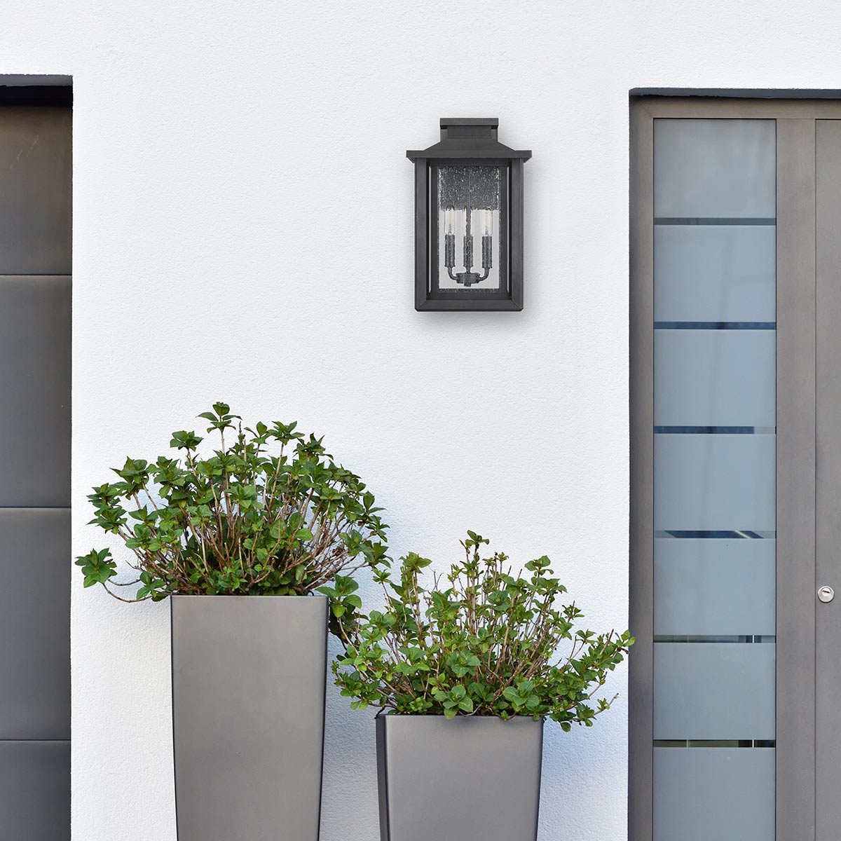 Quoizel Outdoor Wall Light from the Wakefield range. Wakefield 3 Wall Lantern - Large Product Code = QZ-WAKEFIELD-L-TBK